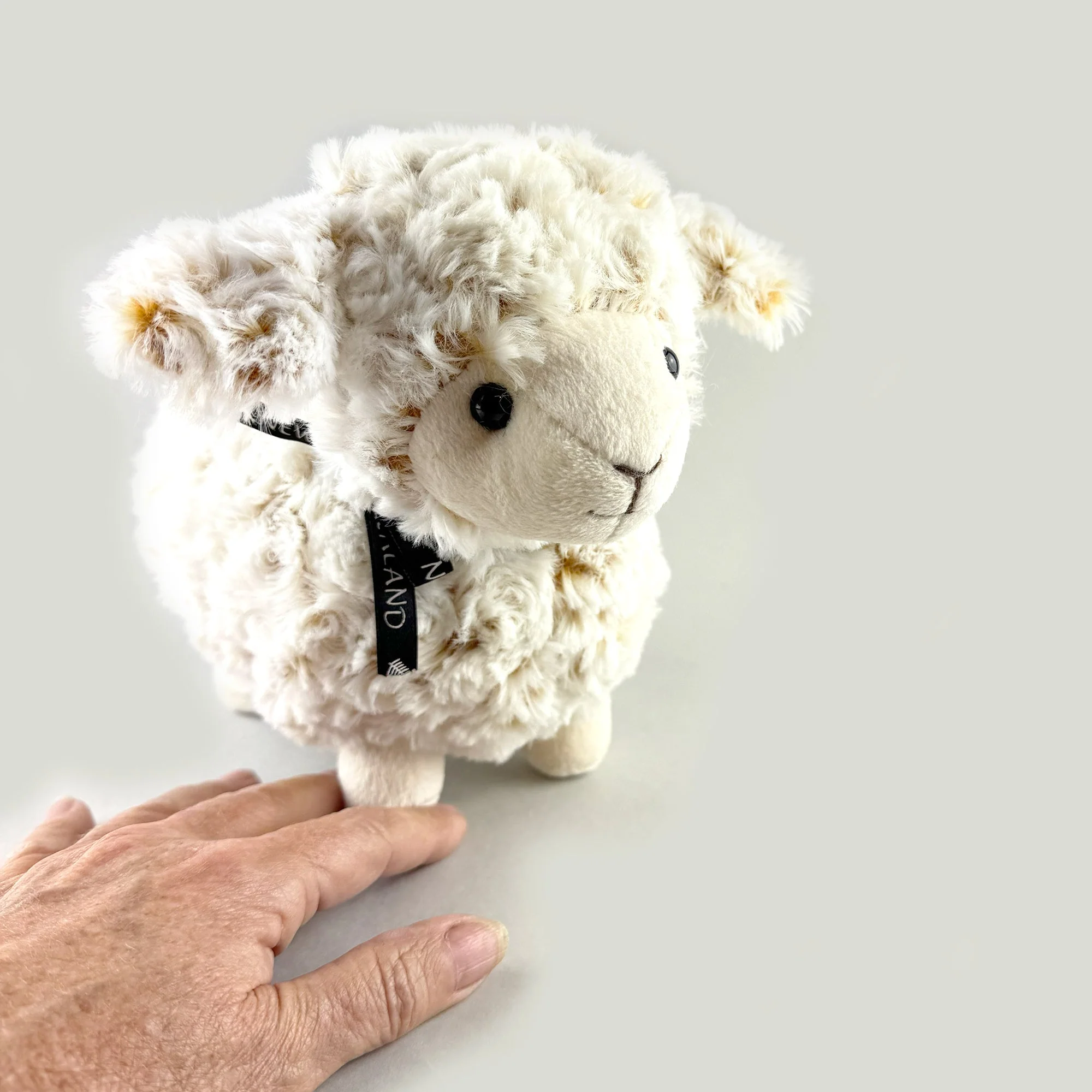 Cute Standing Sheep Soft Toy with Black Ribbon and Curly Fleece - Image 4